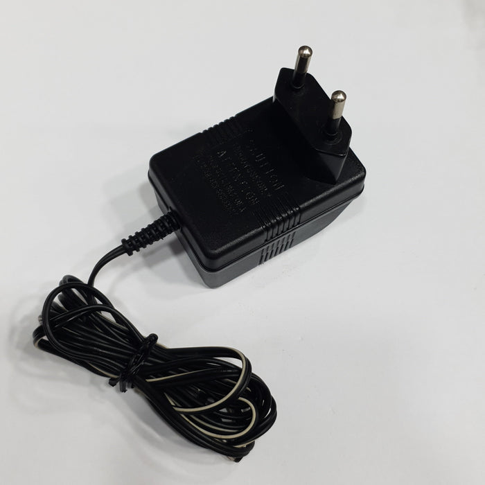 AC-DC ADAPTOR (MODEL HX G41050100) AC INPUT:230V DC OUTPUT:4.5V 100MA  WITH 5.5MM X 2.5MM BARREL PIN