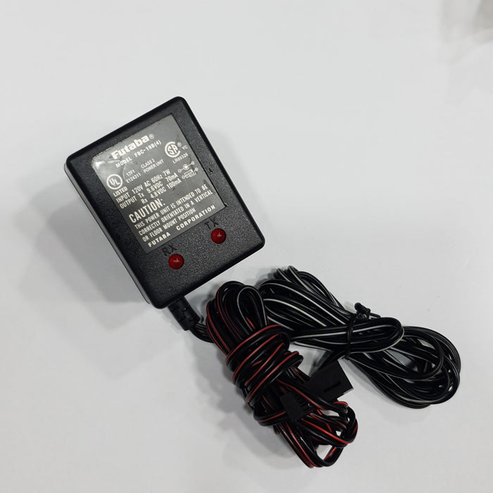 FUTABA MODEL FBC 19B(4) AC INPUT:120V DC OUTPUT:TX 9.6V 70MA / RX 4.8V 100MA